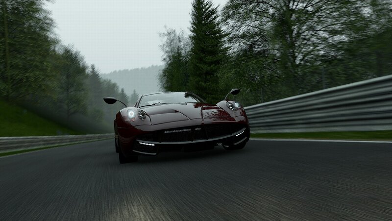 red sports car on racetrack