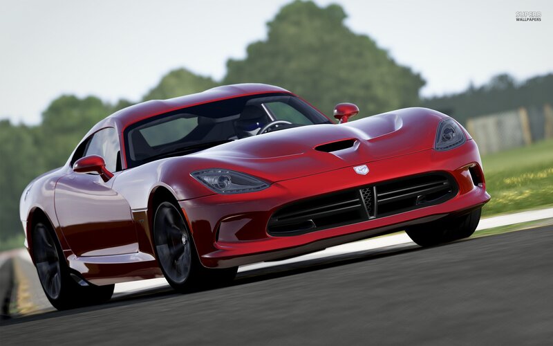 red sports car on racetrack