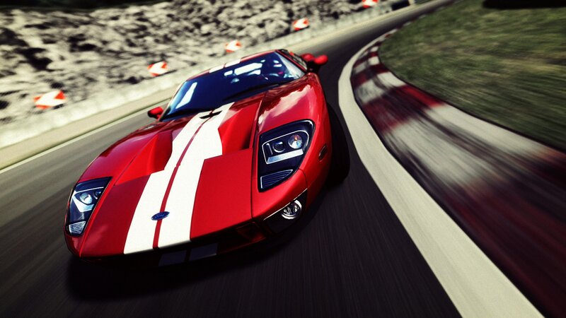 red sports car on racetrack