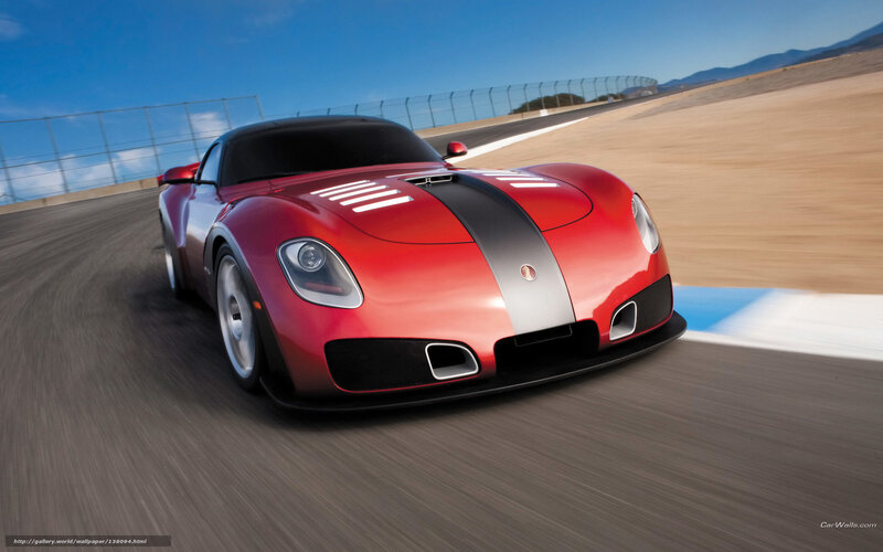 Red sports car on racetrack