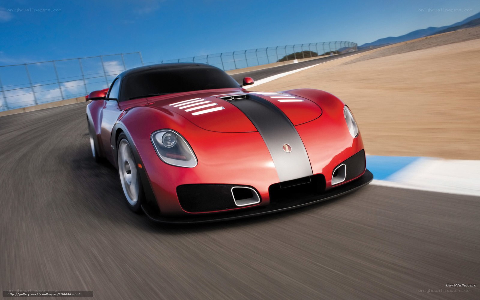 Red sports car on racetrack