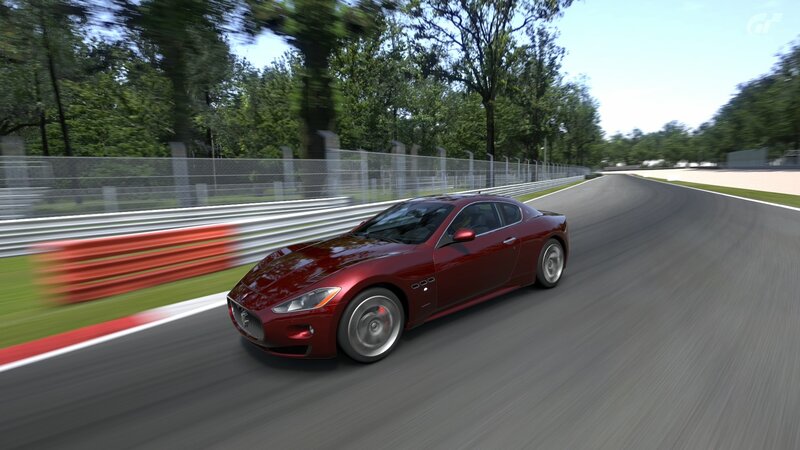 red sports car on racetrack
