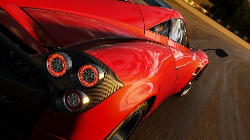 red sports car on racetrack