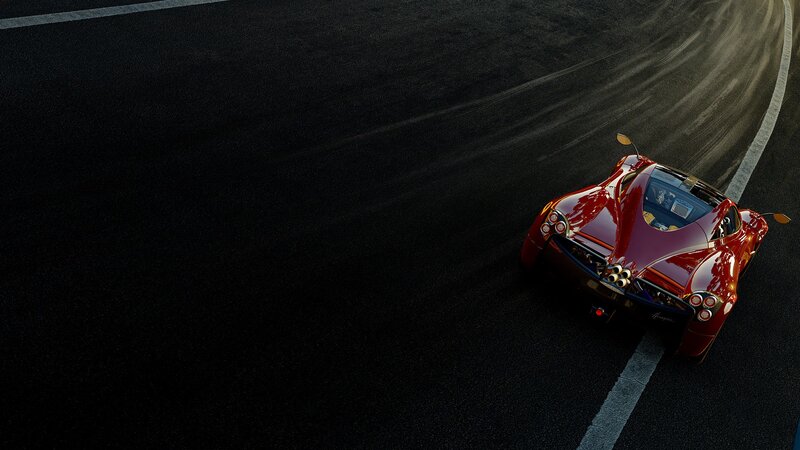 Red sports car on racetrack