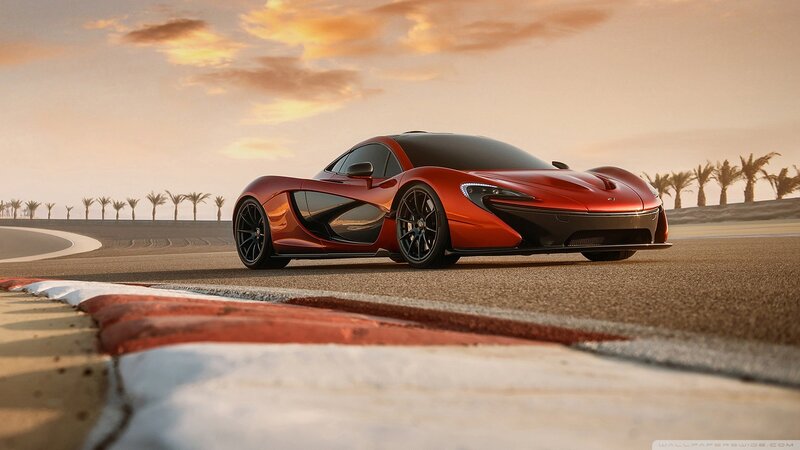 Red sports car on racetrack