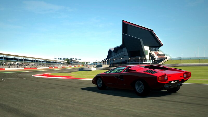 Red sports car on racetrack