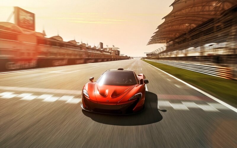 red sports car on racetrack