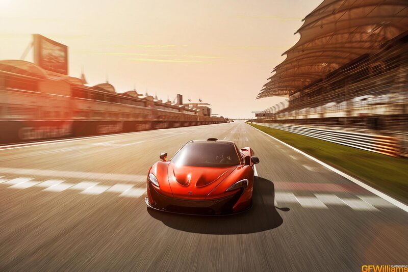 Red sports car on racetrack