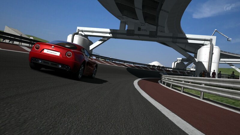 Red sports car on racetrack