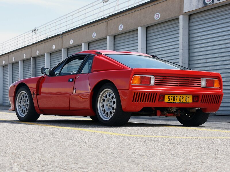 Red sports car on racetrack