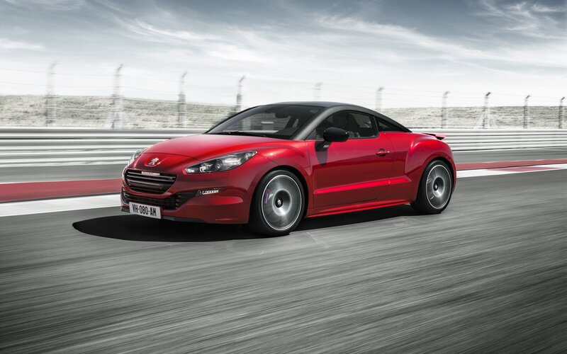Red sports car on racetrack