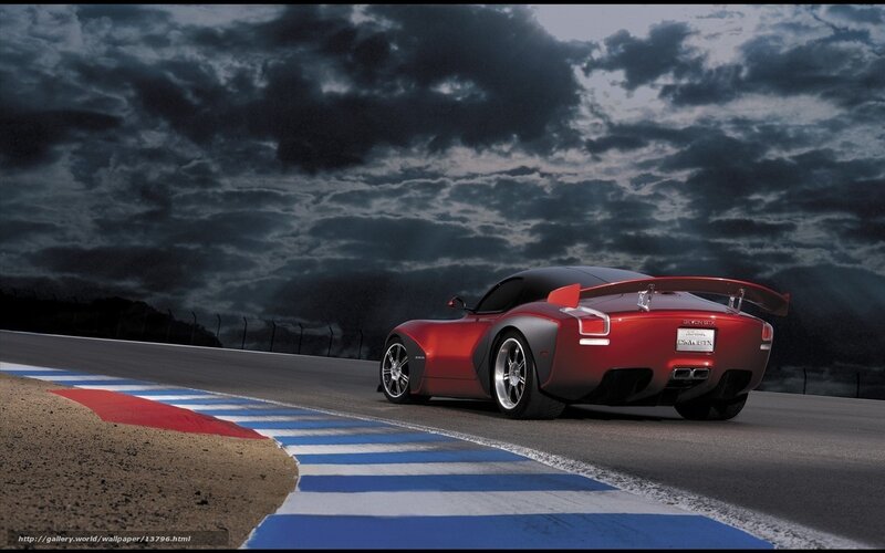 Red sports car on racetrack
