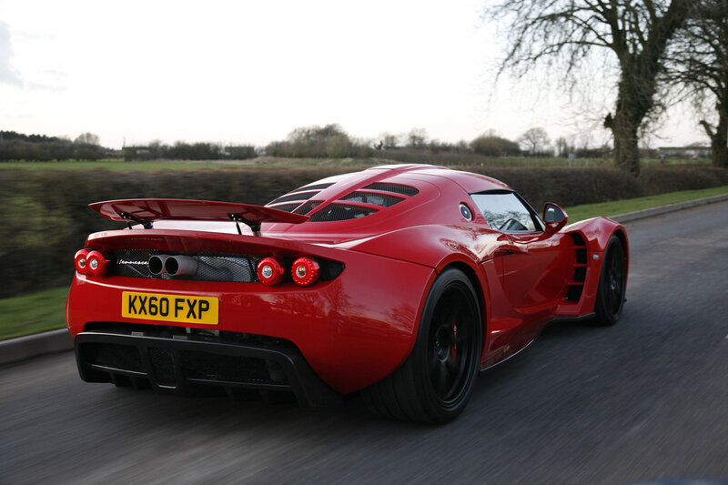 red sports car on road