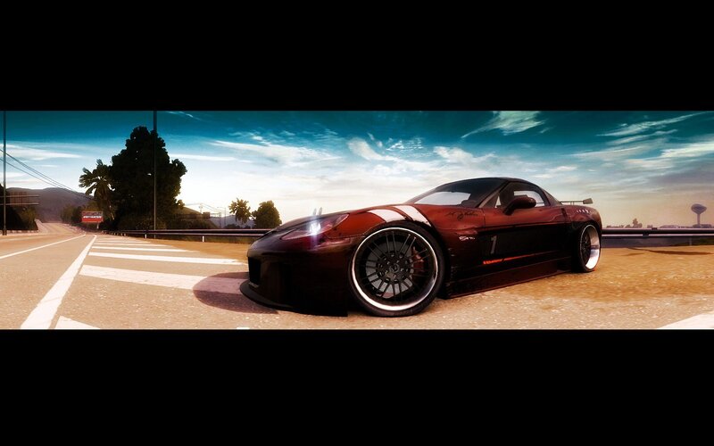 red sports car on road