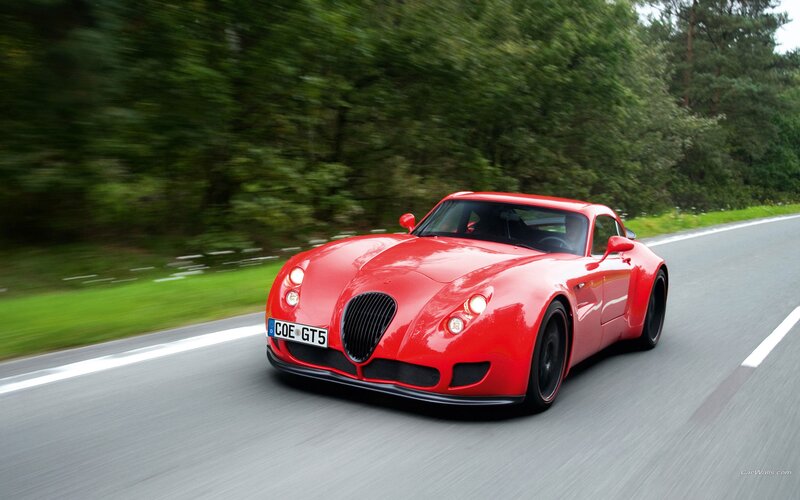 red sports car on road