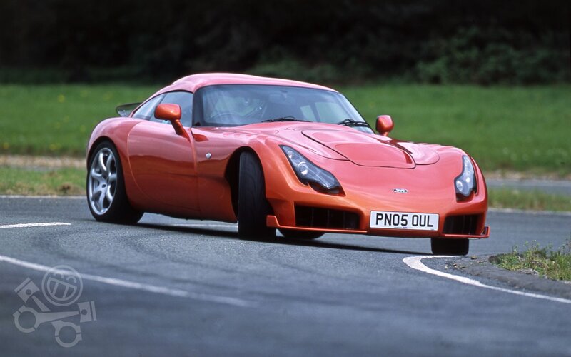 red sports car on road