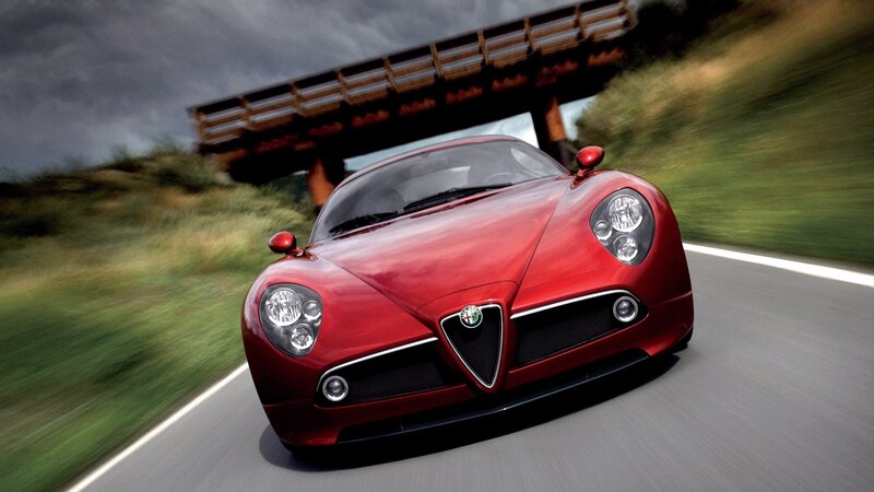 red sports car on road