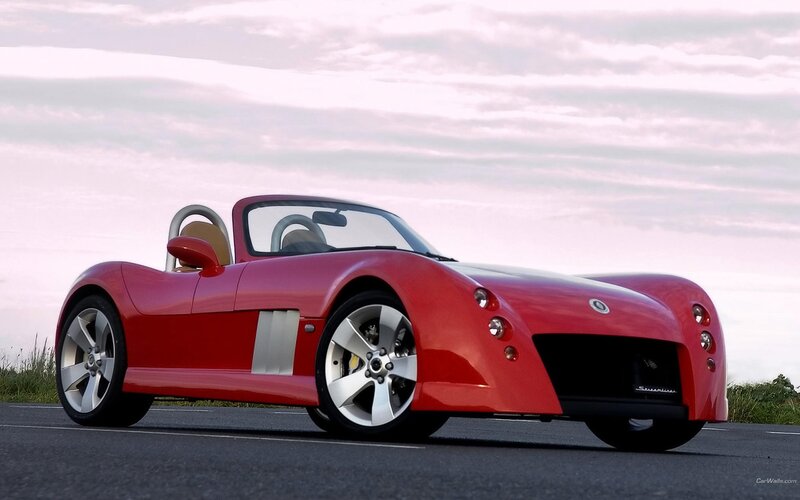 red sports car on road
