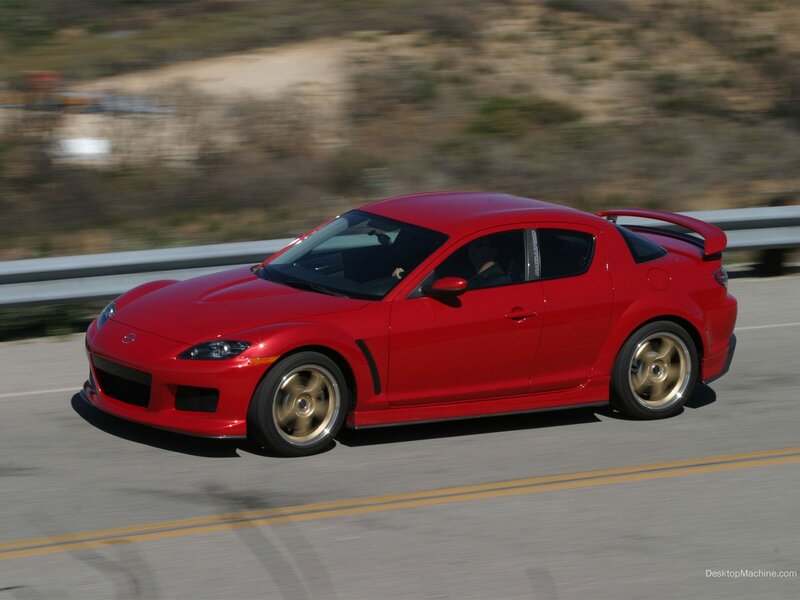 red sports car on road