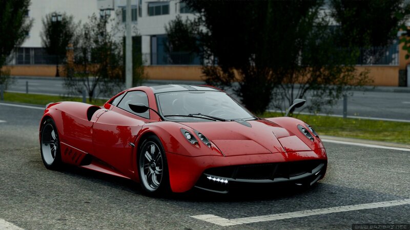 red sports car on road