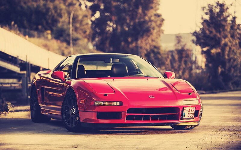 red sports car on road