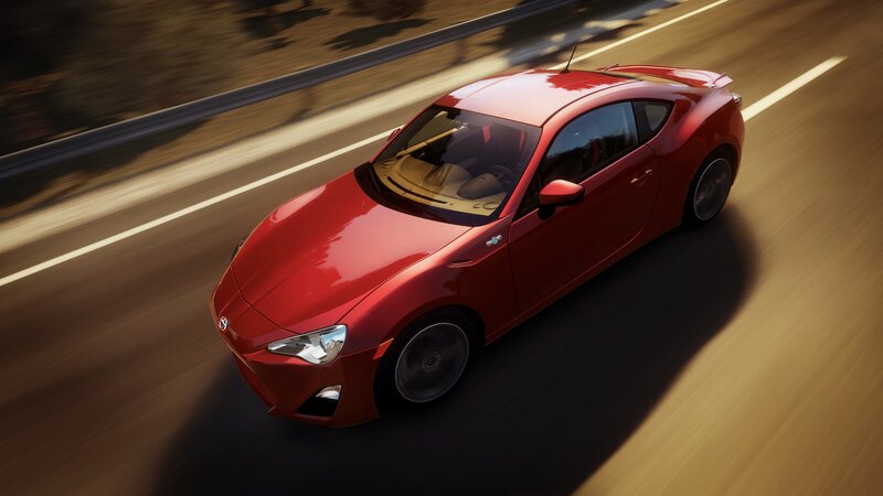 red sports car on road