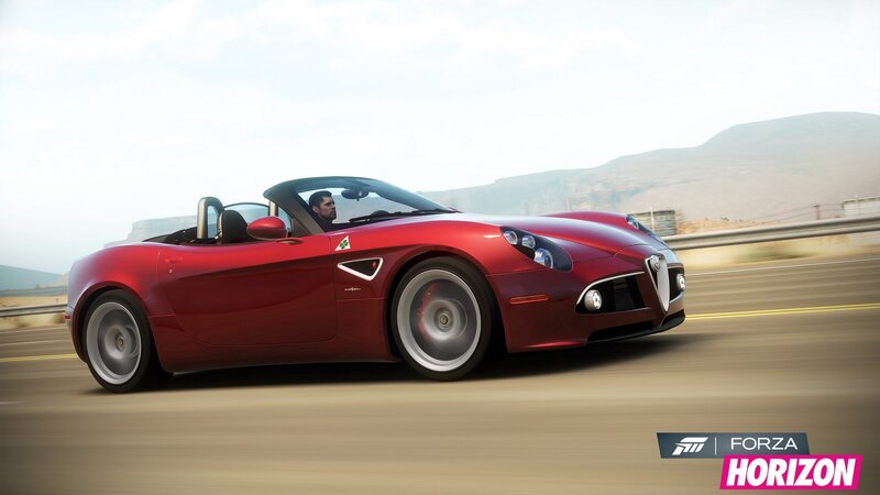 red sports car on road