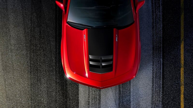 Red sports car on road
