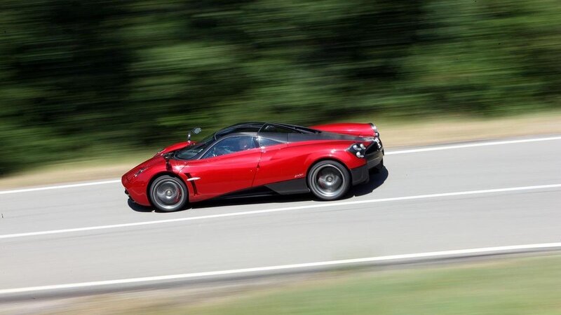 red sports car on road
