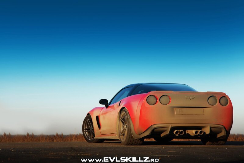 Red sports car on road