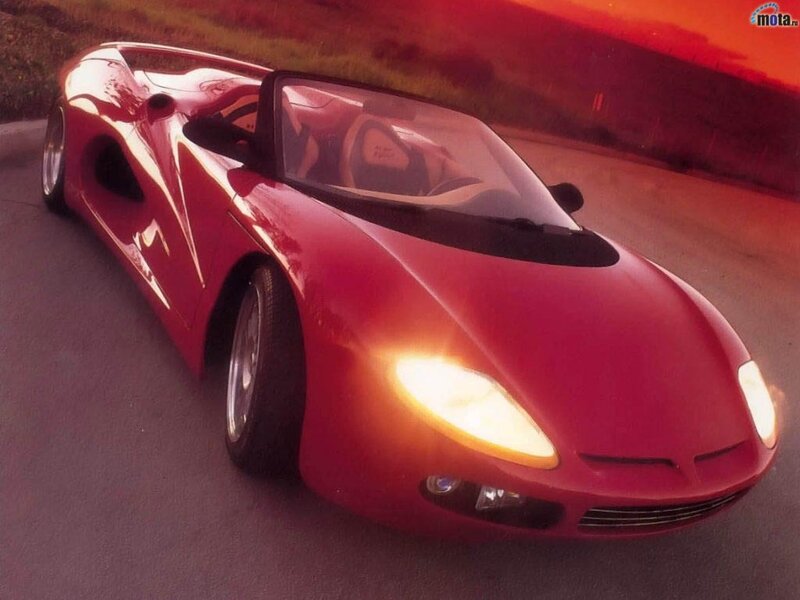 red sports car on road
