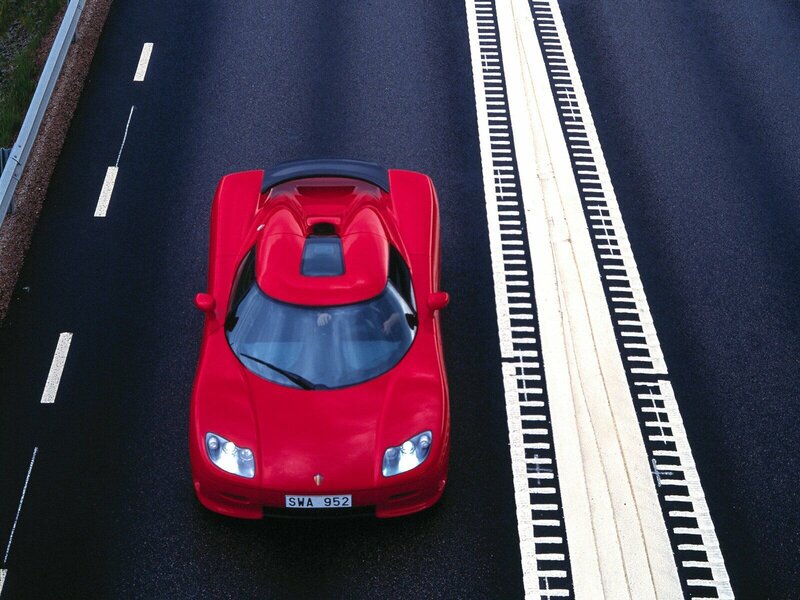 red sports car on road