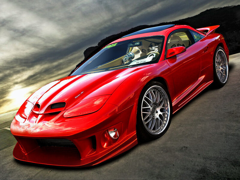 red sports car on road