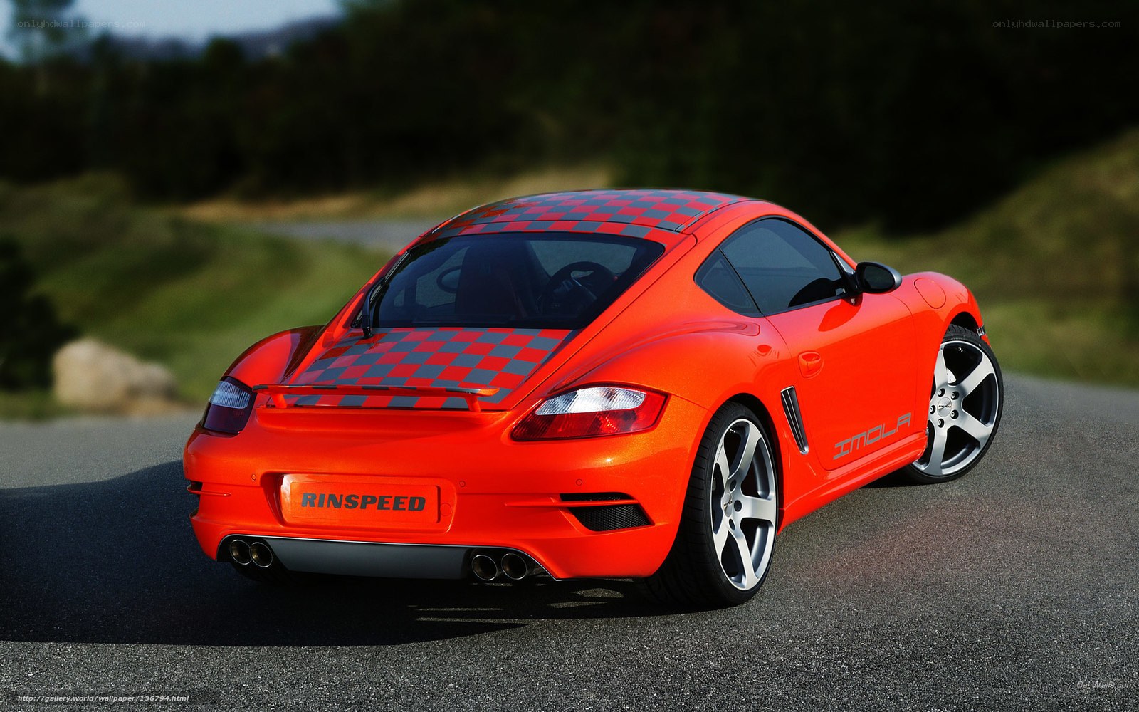 red sports car on road