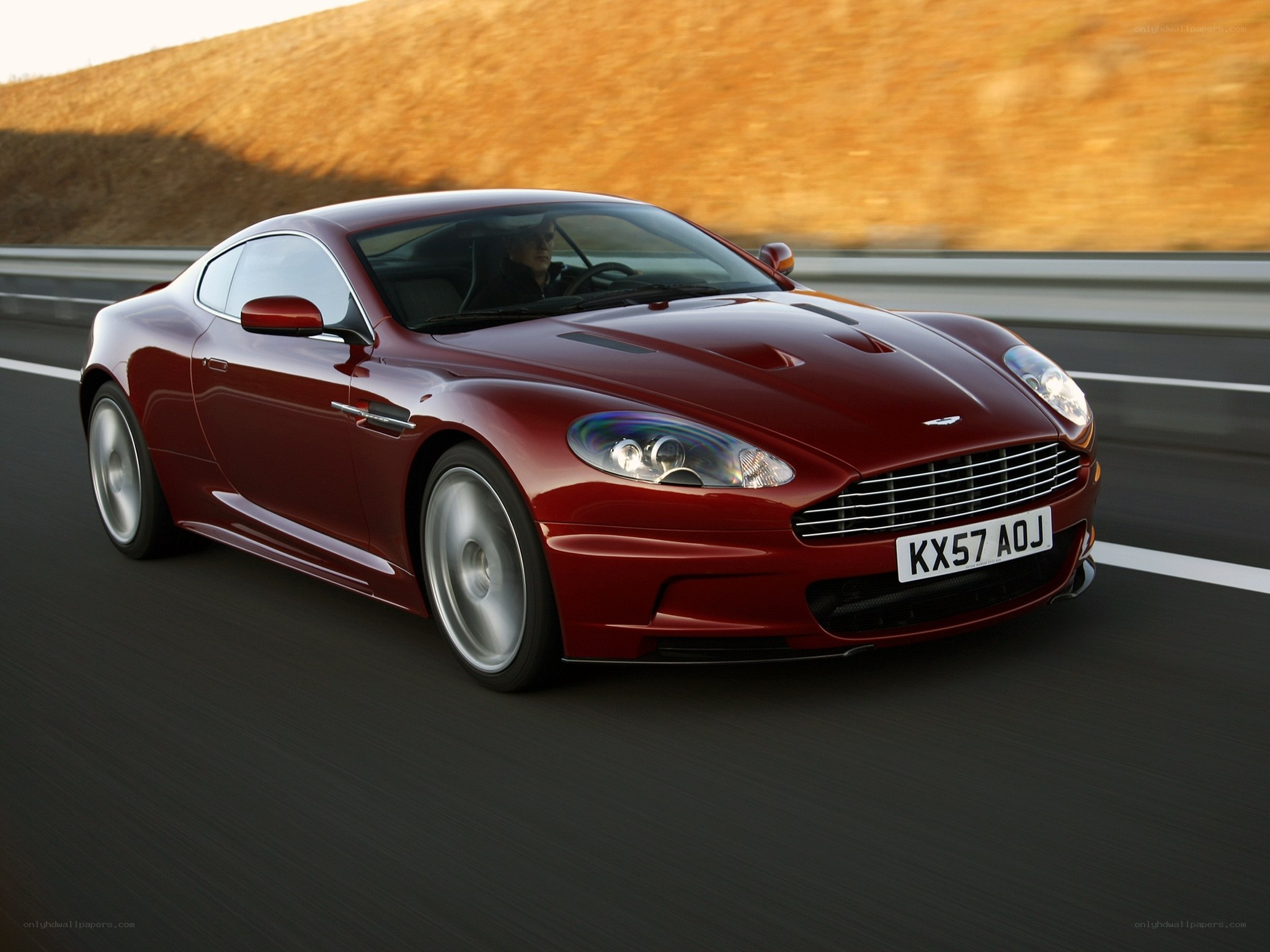 red sports car on road