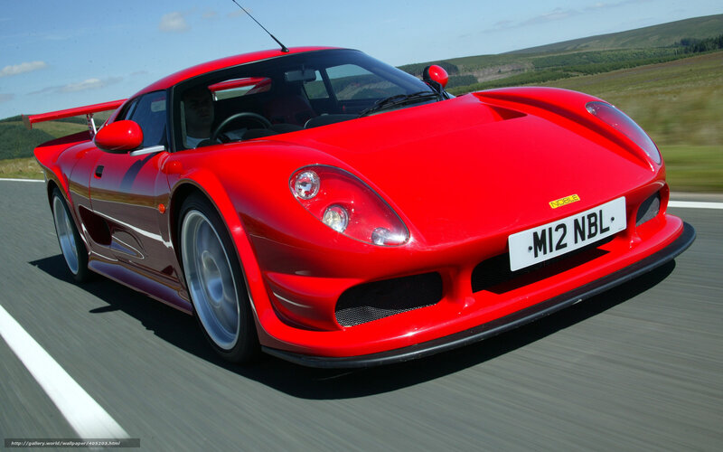red sports car on road