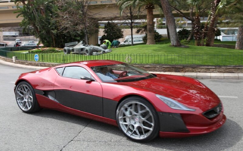Red Sports Car on Road — Calm