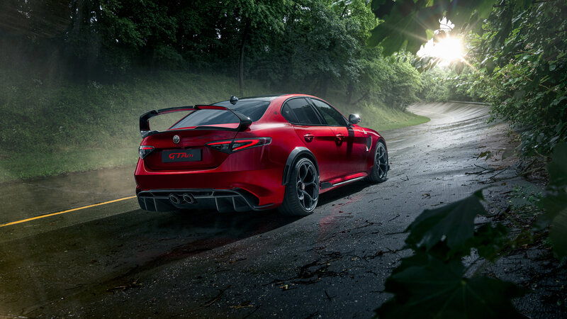 Red Sports Car on Road — Dramatic, Afternoon, Photograph, Trees, Sunlight