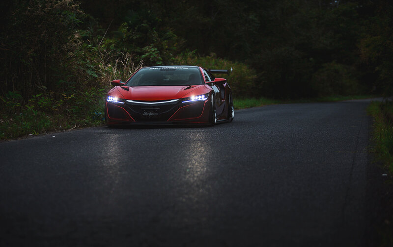 Red Sports Car on Road — Dramatic, Night, Photograph, Trees, Headlights