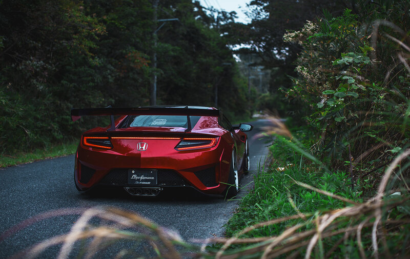 Red Sports Car on Road — Dramatic, Night, Photograph, Trees, Tall Grass