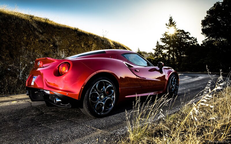 Red Sports Car on Road — Dramatic, Sunset, Photograph, Trees, Hill