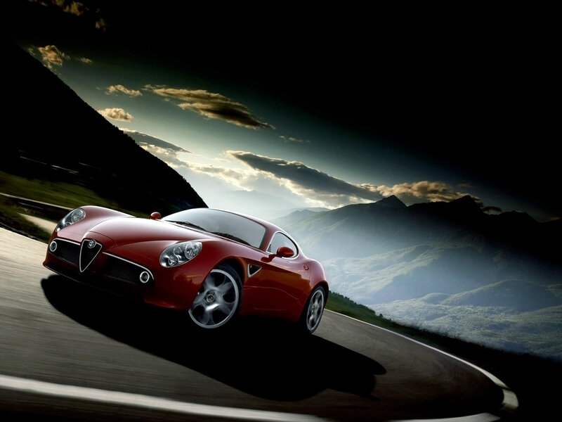 Red Sports Car on Road — Dramatic
