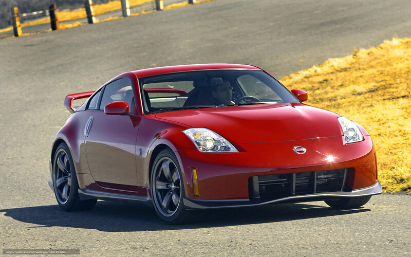 Red Sports Car on Road — Dynamic, Afternoon, Photograph, Driver