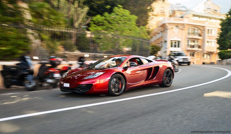 Red Sports Car on Road — Dynamic, Afternoon, Photograph, Motorcycles