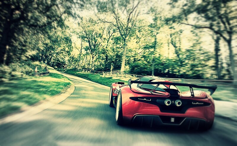 Red Sports Car on Road — Dynamic, Afternoon, Photograph, Trees