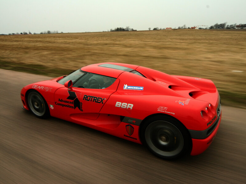 Red Sports Car on Road — Dynamic, Photograph