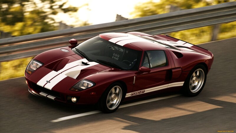 Red Sports Car on Road — Maroon