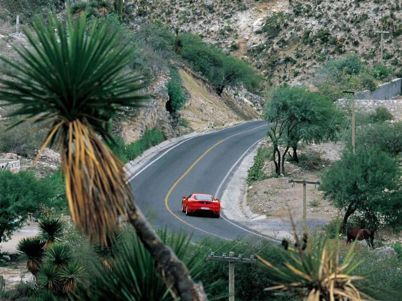 Red Sports Car on Road — Serene