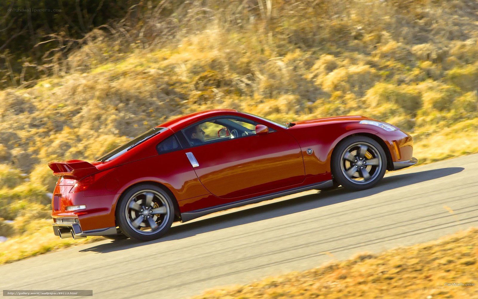 red sports car on road