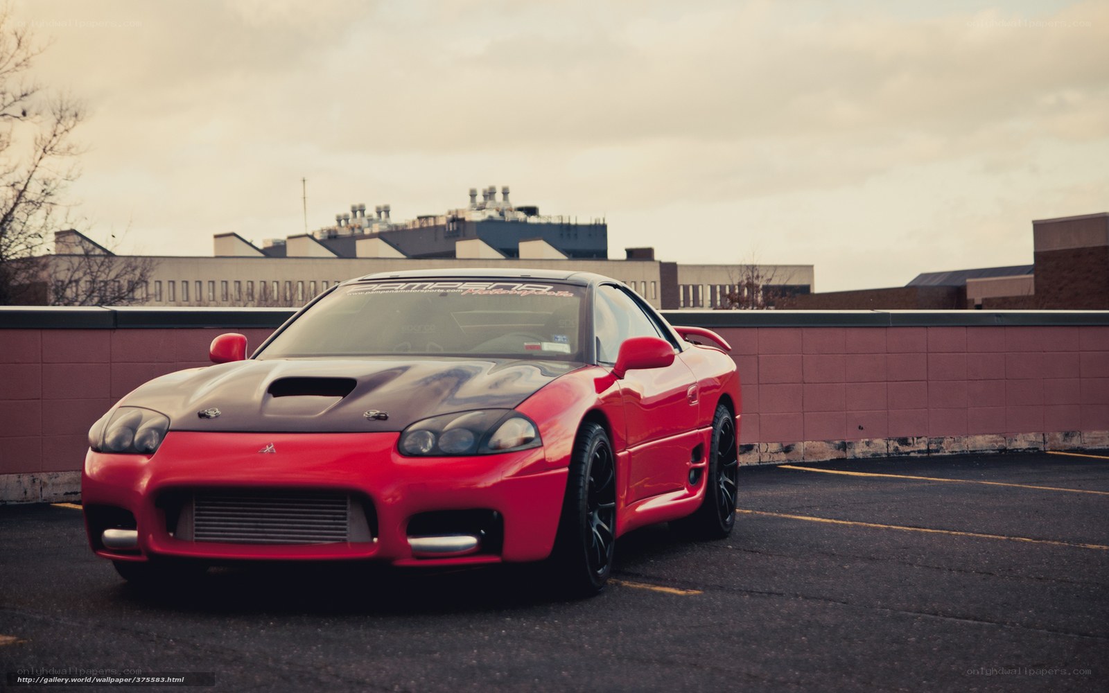 Red sports car on rooftop